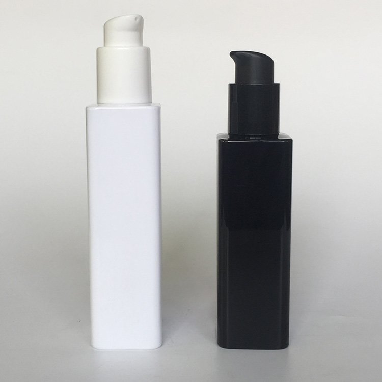 Black white square bottle with colorful spray pump