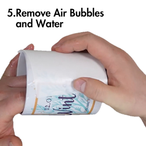 Step 5: Remove Air Bubbles and Water
After positioning the paper, use your fingers, a damp cloth/paper towel or a mini squeegee to remove air bubbles and excess water, then slide the backing off. It should slide easily. Gently pad off any excess water.
