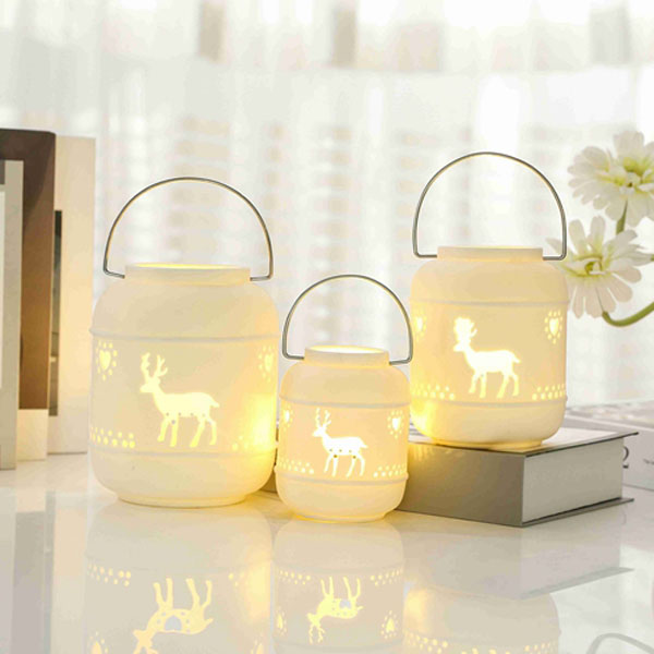 White ceramic deer cutout LED lantern tabletop decor